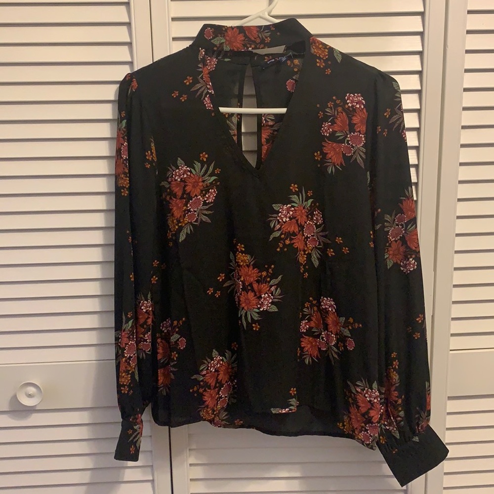 Black floral blouse